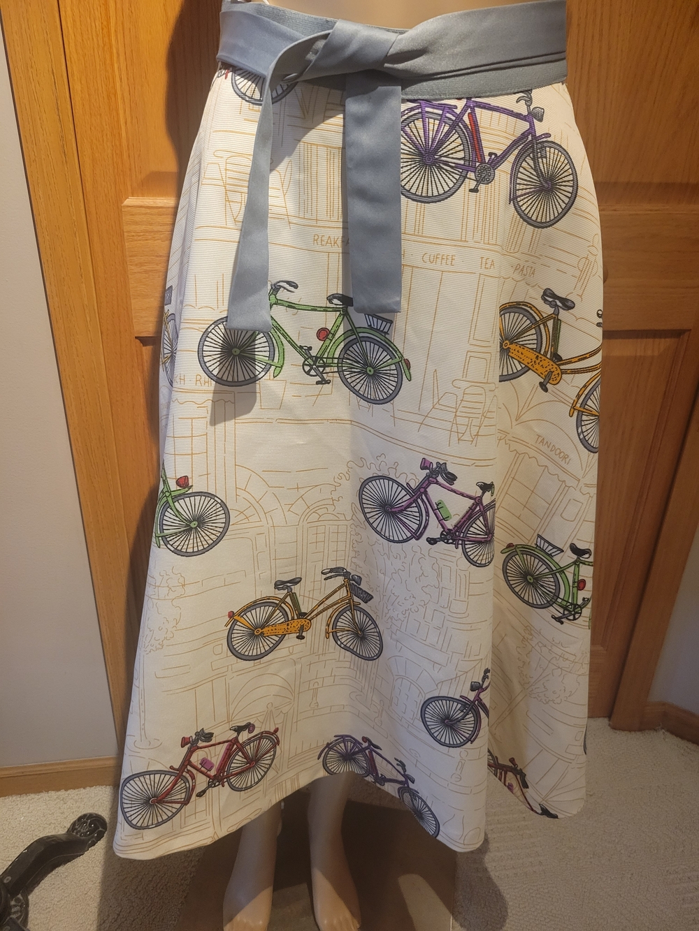 Gracia Cream A-Line Skirt with Multicolor Bicycle Print and Gray Waist Tie